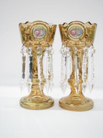 Appraisal: A pair of antique champagne amber glass lustres with crystal