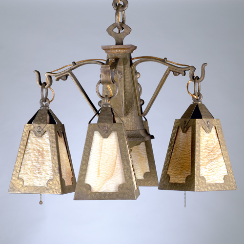 Appraisal: LIGHTING Brass chandelier with four lanterns lined in caramel slag