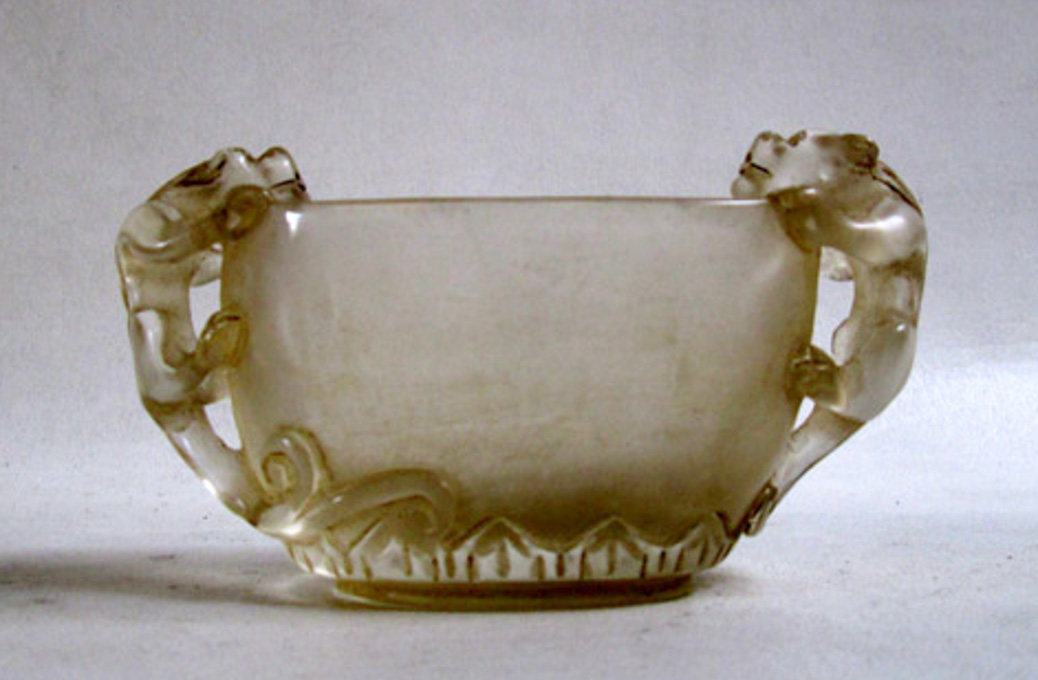 Appraisal: CHINESE CARVED AGATE BOWL a carved and polished translucent agate