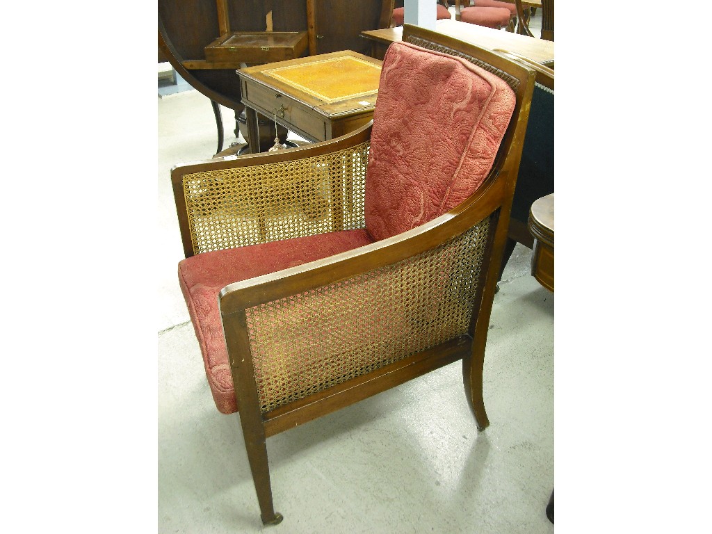 Appraisal: Edwardian mahogany inlaid bergere armchair supported on square tapering legs