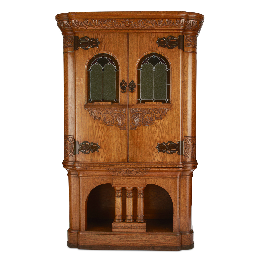 Appraisal: CONTINENTAL CELTIC REVIVAL CARVED OAK SIDE CABINET AND COMPANION CABINET