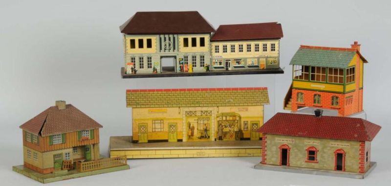 Appraisal: Lot of Tin Train Buildings Description German and English For