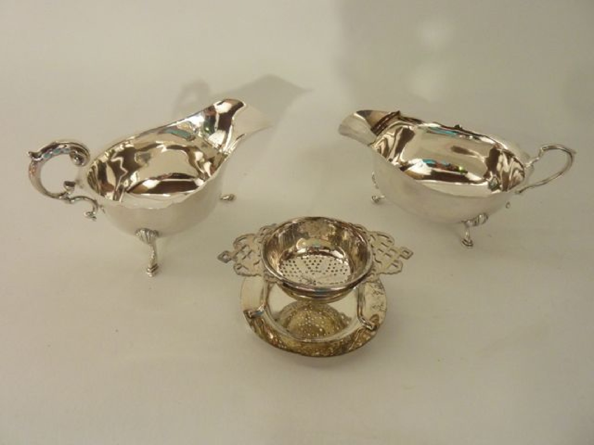 Appraisal: An assembled pair of gravy boats S Blanckensee Sons Ltd