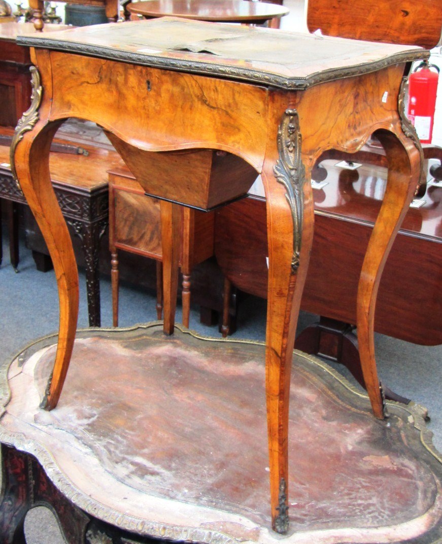 Appraisal: A Victorian gilt metal mounted walnut work table with single