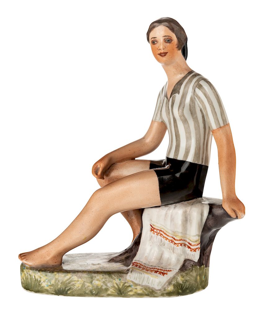 Appraisal: A RUSSIAN PORCELAIN FIGURE OF A FEMALE FOOTBALL PLAYER AFTER