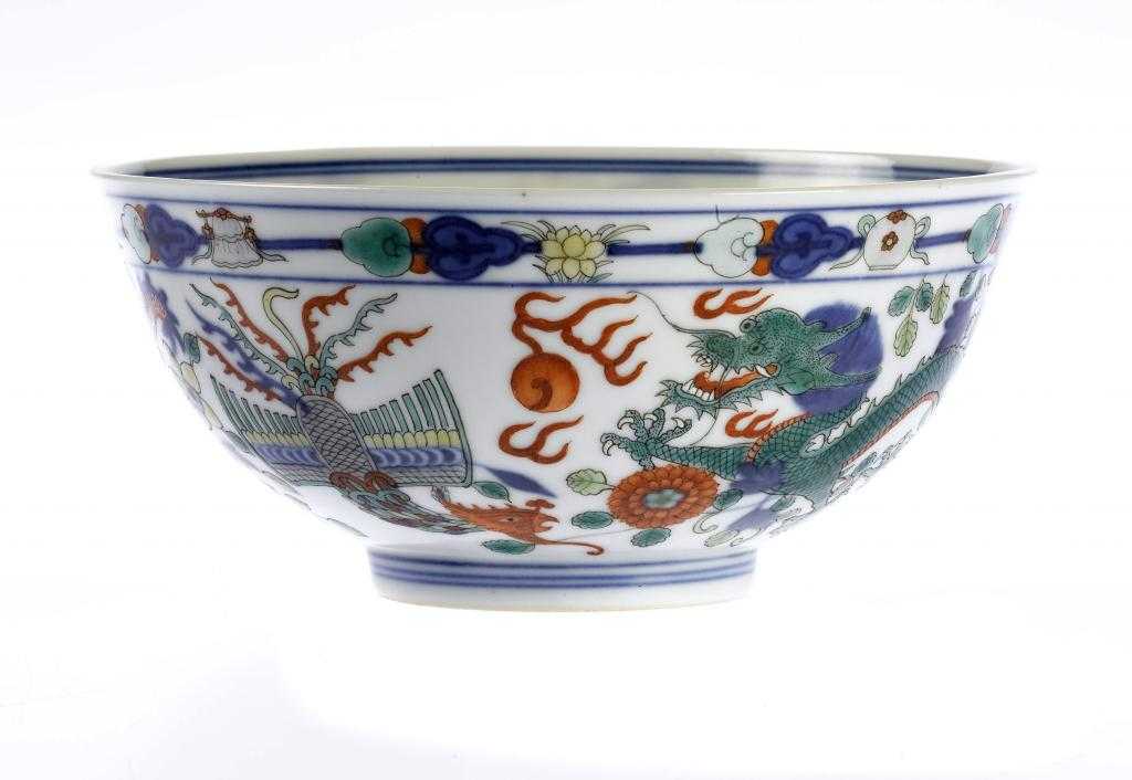 Appraisal: A CHINESE WUCAI DRAGON AND PHOENIX BOWL with gently rounded