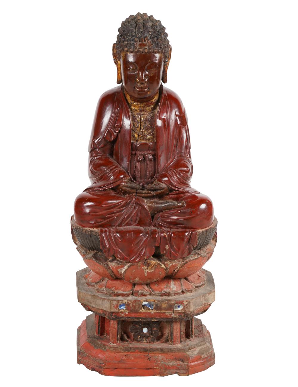 Appraisal: RED LACQUERED CARVED WOOD BUDDHA FIGUREVietnamese the base with inset