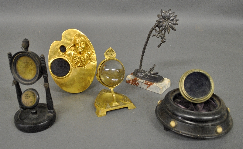 Appraisal: - Five watch holders including a brass magnifying glass form