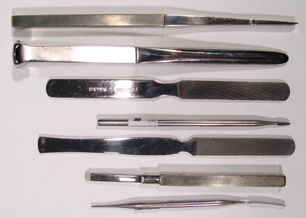 Appraisal: Seven World War II military surgical instruments - Two chisels