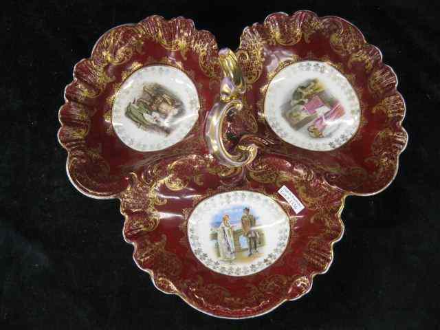 Appraisal: Porcelain Serving Dish center handle with compartments various scenes burgundy