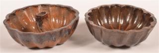 Appraisal: Two Glazed Redware Pottery Food Molds Two th Century Glazed