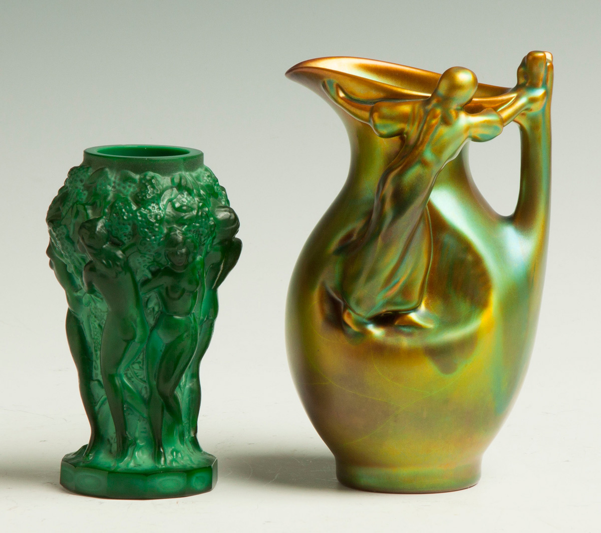 Appraisal: Malachite Vase With Dancing Nudes Early th cent