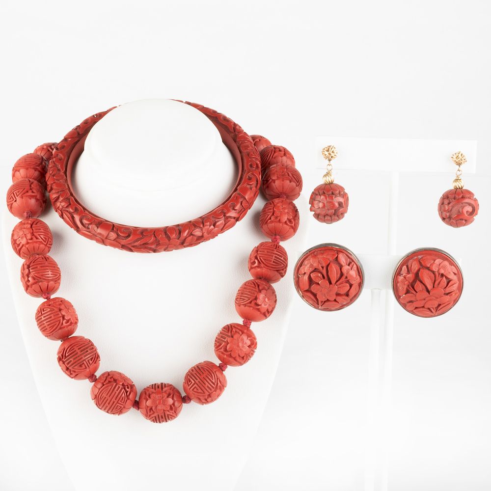 Appraisal: Group of Cinnabar Colored Jewelry Comprising a beaded necklace a