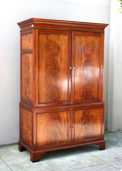 Appraisal: A George III style mahogany linen press th century height