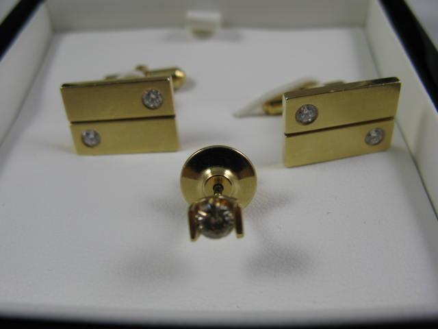 Appraisal: KT Cufflinks KT Tieback cufflinks with four round diamonds approximate