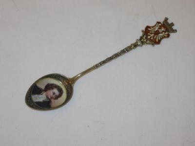 Appraisal: A GERMAN SILVER ENAMEL TEA SPOON the bowl depicting a