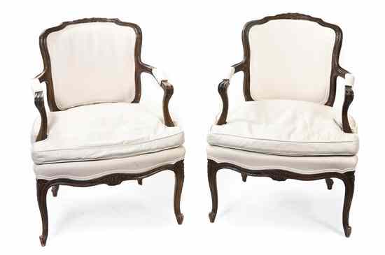 Appraisal: A Pair of Louis XV Style Fauteuils having a foliate