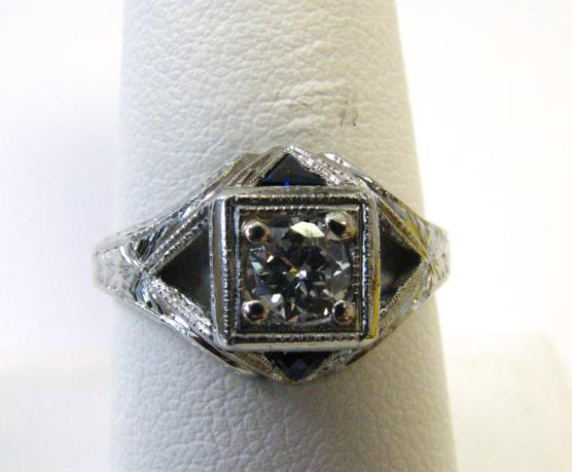 Appraisal: K white gold antique engraved diamond and sapphire lady's ring