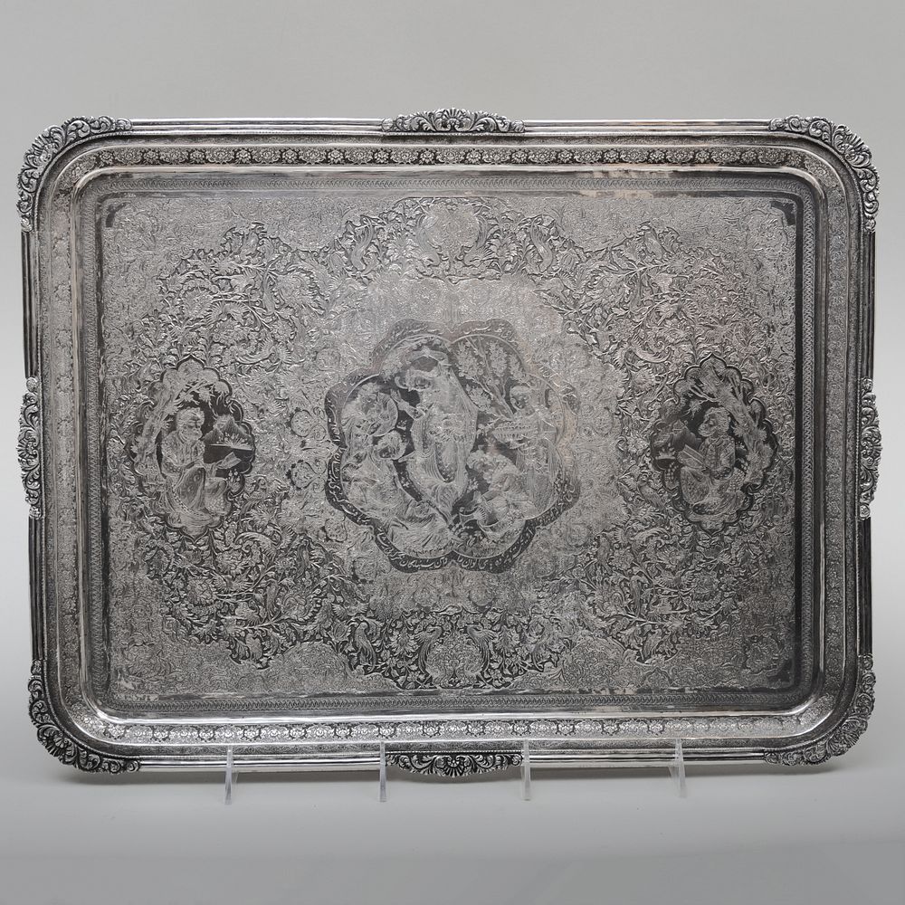 Appraisal: Persian Rectangular Silver Tray Indistinctly marked densely chased with figures