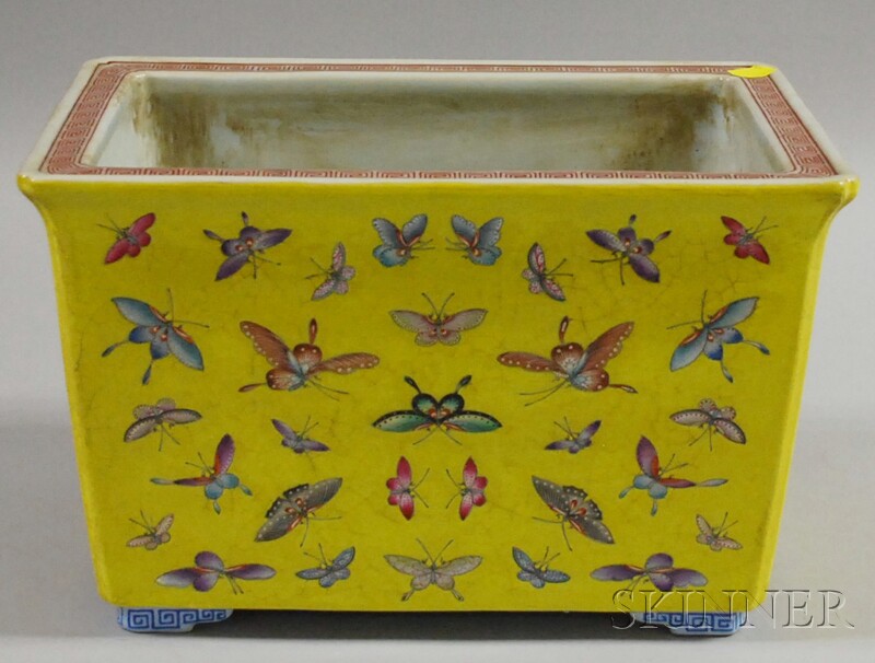 Appraisal: Chinese Famille Jaune Butterfly-decorated Porcelain Footed Planter ht lg wd