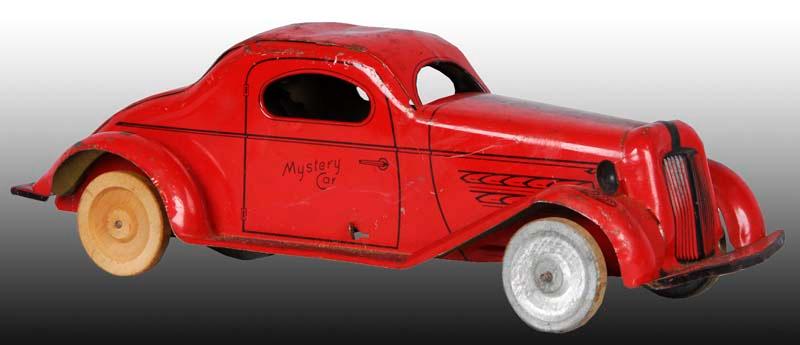 Appraisal: Marx Tin Mystery Car Push Toy Description '' L Wood