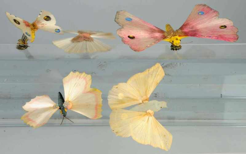 Appraisal: Lot of Spun Glass Butterflies Description Includes three clip-ons and