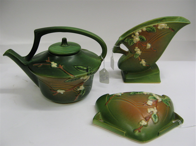 Appraisal: THREE PIECES ROSEVILLE POTTERY in the Snowberry pattern green fields