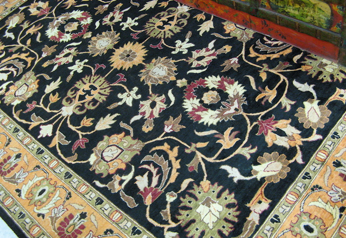 Appraisal: HAND KNOTTED ORIENTAL CARPET Pakistani Persian overall scrolling floral raceme