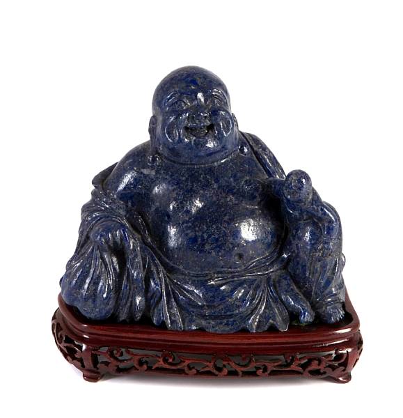 Appraisal: A carved sodalite figure of Putai and attendant th century