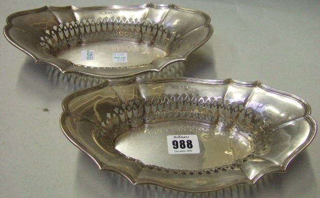 Appraisal: A pair of silver shaped oval sweetmeat dishes with pierced