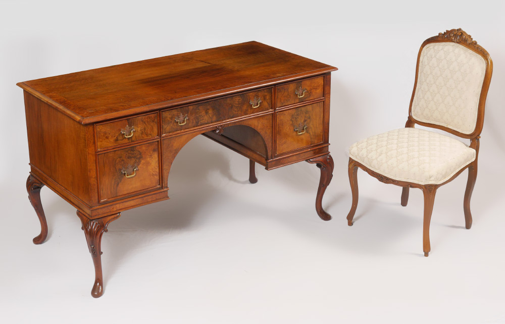 Appraisal: BURL WALNUT CHIPPENDALE STYLE DESK AND CHAIR Burl veneer desk