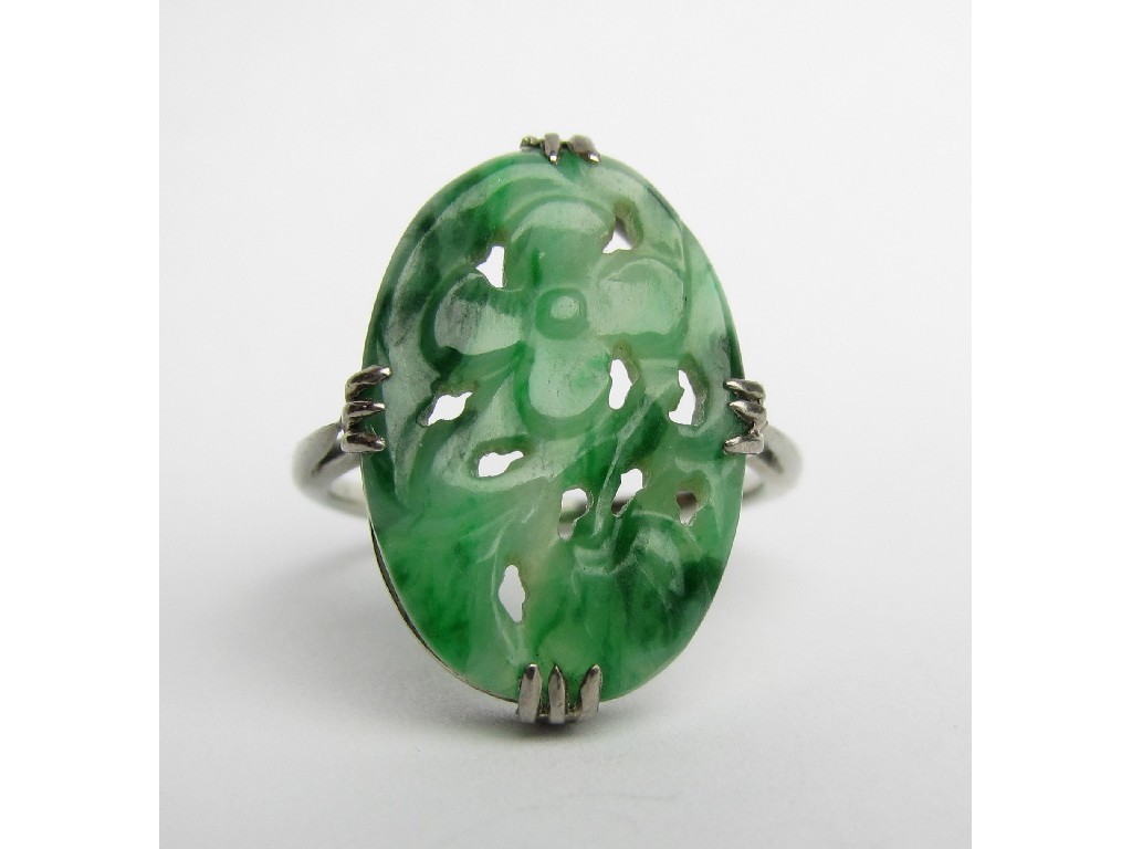 Appraisal: Two Chinese white gold carved jade set dress rings one