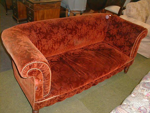 Appraisal: A Victorian Chesterfield high back sofa with sculptured devor velvet