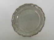 Appraisal: A Swedish assay silver plate of shaped circular form with