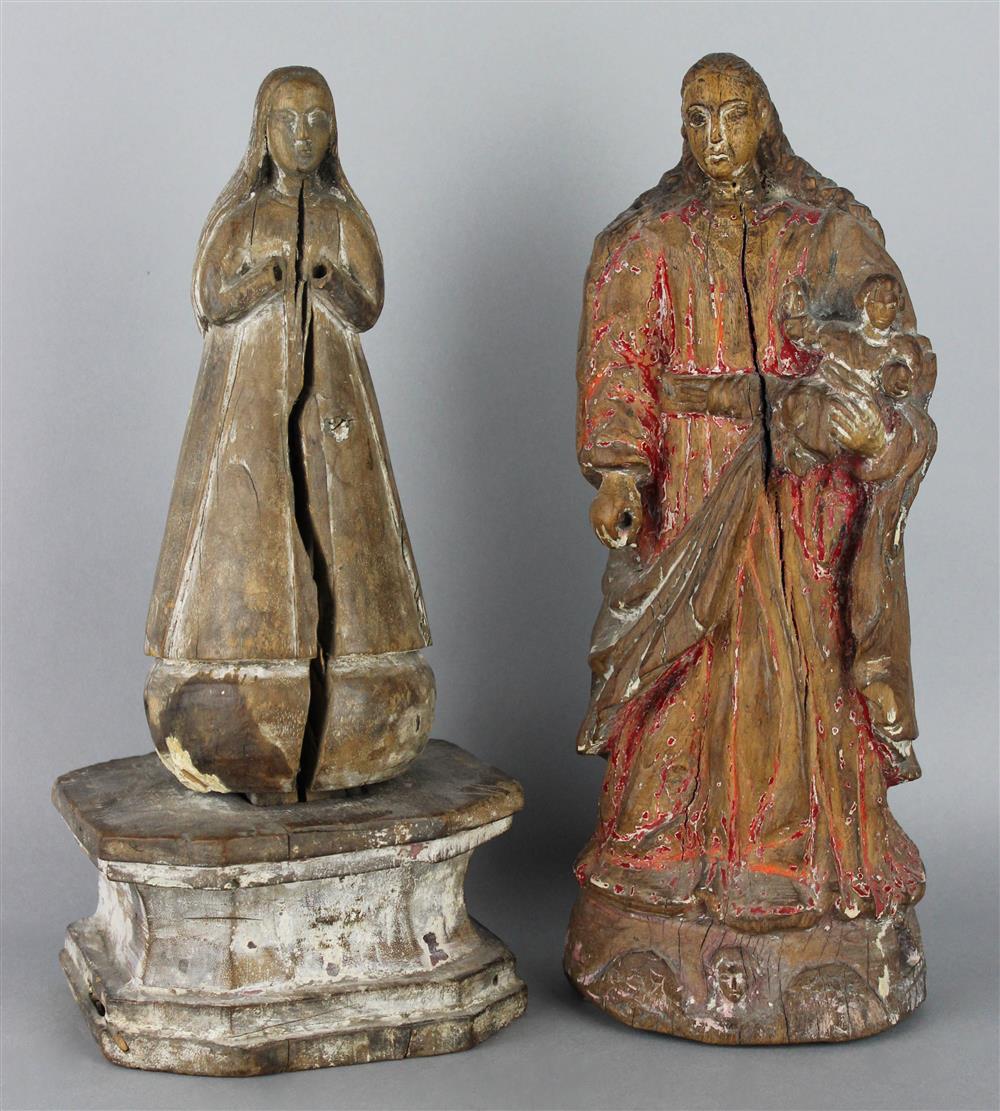 Appraisal: TWO CARVED WOOD SANTOS FIGURES one of Mary and Jesus