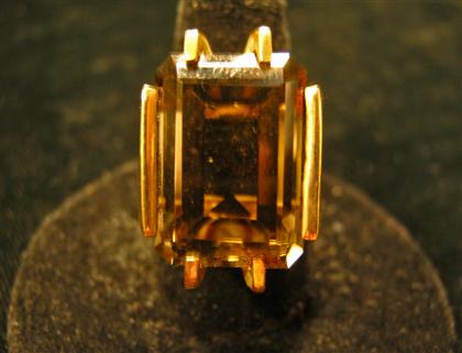 Appraisal: karat yellow gold and smokey topaz ringProng set