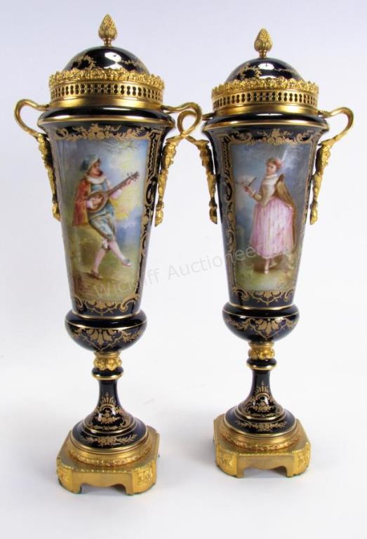 Appraisal: A pair of Sevres lidded porcelain vase figural cast metal