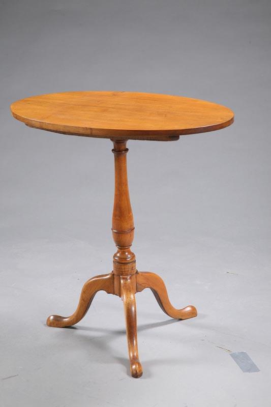 Appraisal: TILT TOP CANDLESTAND Maple with an oval top turned baluster