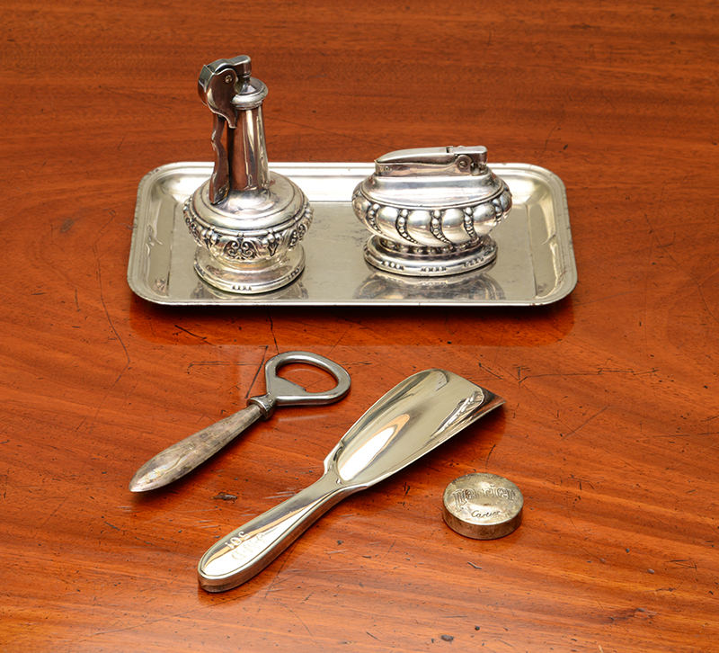 Appraisal: Cartier Sterling Bottle Opener and 'Perrier' Lid Together with a