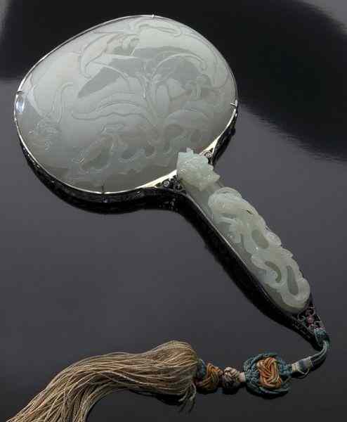 Appraisal: Chinese Qing jade inlaid silver hand mirror the jade plaque