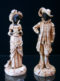 Appraisal: A pair of figures in porcelain simulating ivory of a