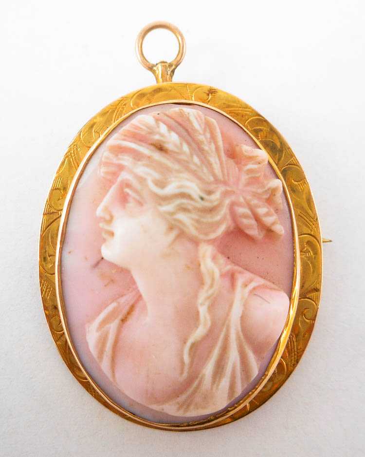 Appraisal: PINK CAMEO AND TEN KARAT GOLD PENDANT BROOCH with a