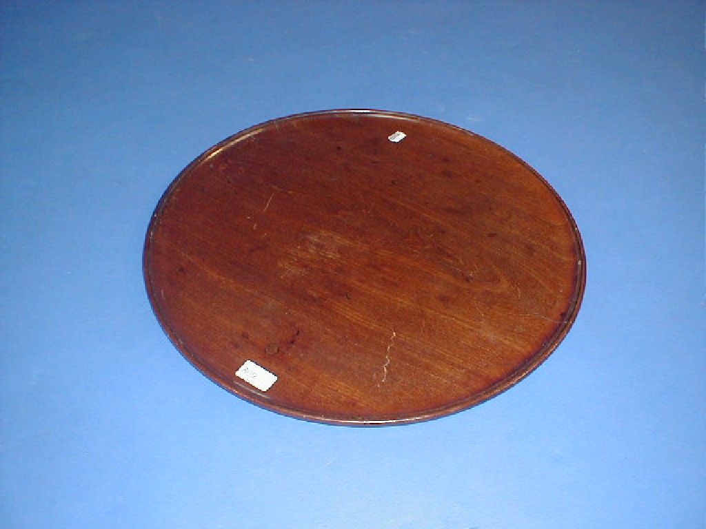 Appraisal: A thC mahogany serving tray with moulded dish top diameter