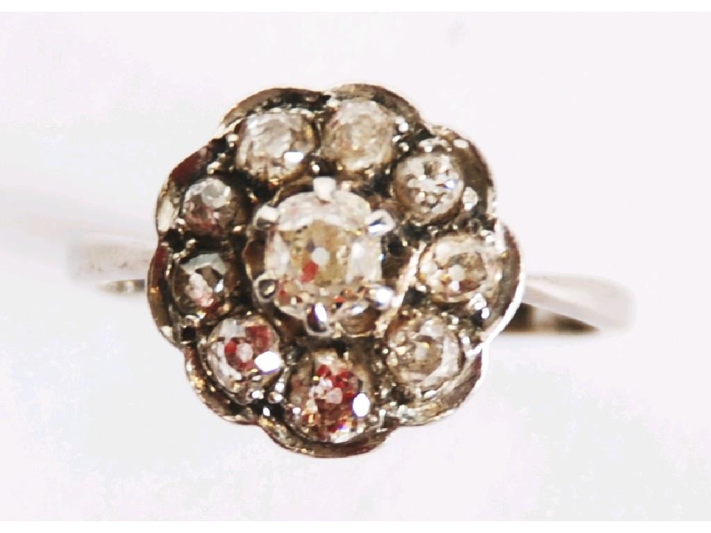 Appraisal: EARLY TWENTIETH CENTURY ct WHITE GOLD AND DIAMOND DAISY CLUSTER