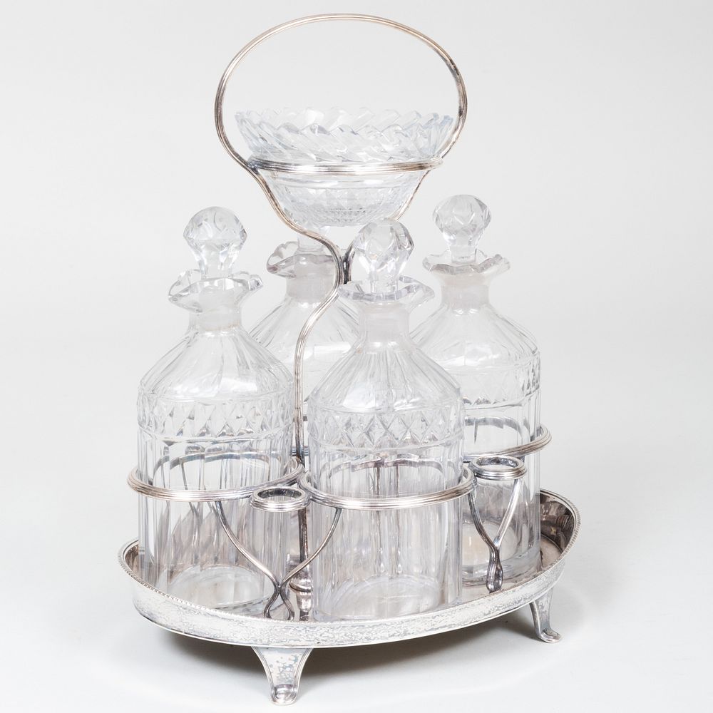 Appraisal: Cut Glass Cruet Set in a Silver Plate Stand Comprising