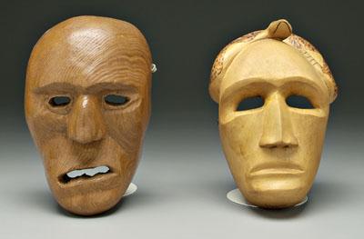 Appraisal: Two carved Cherokee masks one with carved and burn-decorated snake