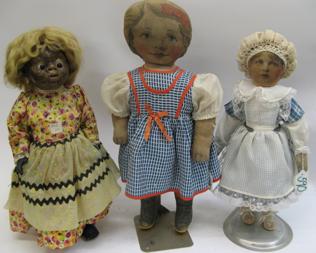 Appraisal: THREE EARLY HAND MADE GIRL DOLLS Two are all cloth