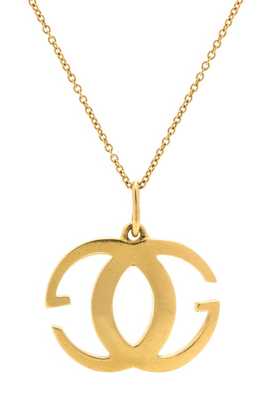 Appraisal: Sale Lot An Karat Yellow Gold Pendant Gucci in an