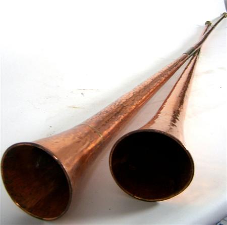 Appraisal: TWO BRASS AND COPPER HUNTING HORNS Largest cm long