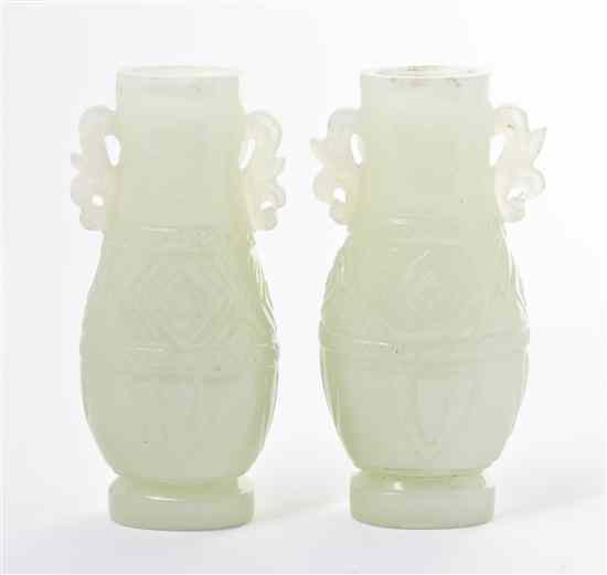 Appraisal: A Pair of Carved Hardstone Vases of light celadon colored